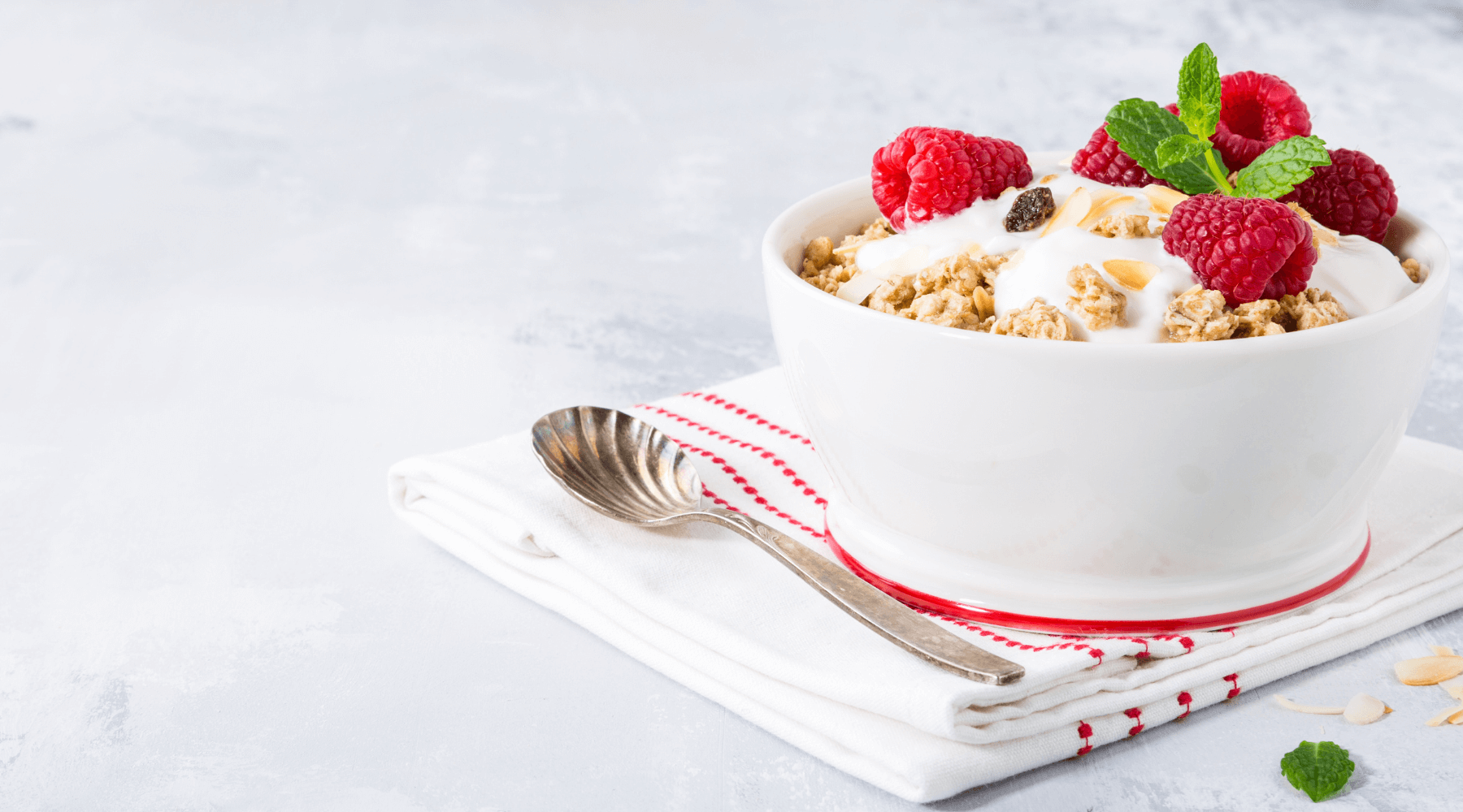 Greek yogurt with honey and nuts in glass jar