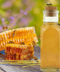 Close-up of 1 lb Muth Jar filled with raw Arizona wildflower honey