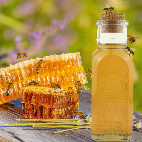 Close-up of 1 lb Muth Jar filled with raw Arizona wildflower honey